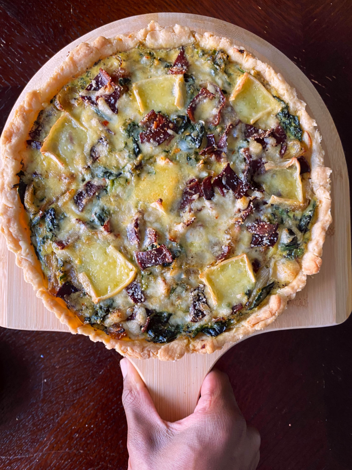 Blue cheese tart on a board